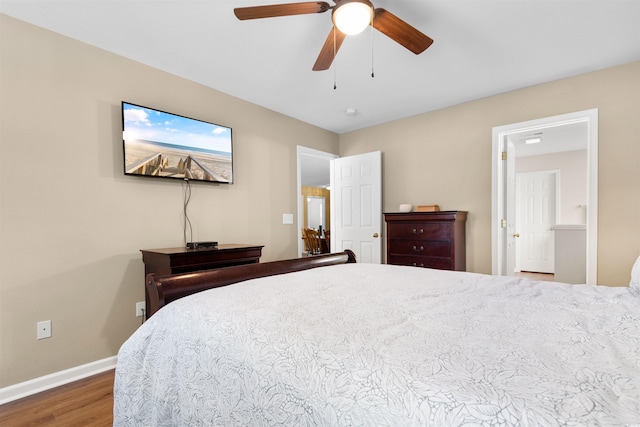 bedroom with wood-type flooring and ceiling fan