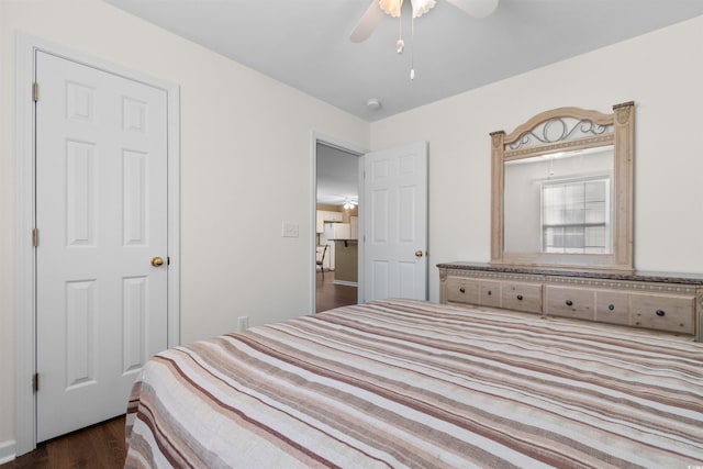 bedroom featuring dark wood-type flooring and ceiling fan