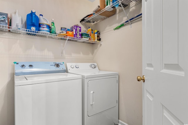 laundry area with washing machine and dryer