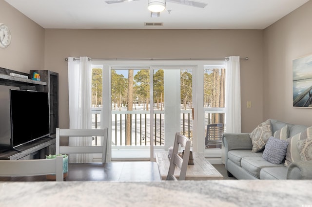 living room with ceiling fan