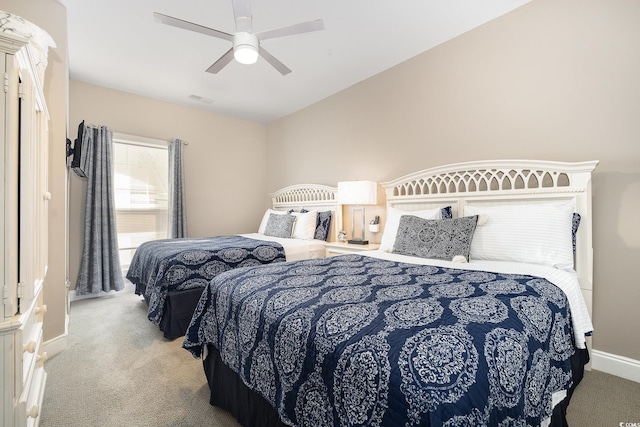 carpeted bedroom featuring ceiling fan