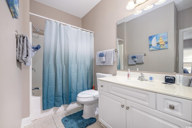 full bathroom with tile patterned flooring, shower / tub combo, vanity, and toilet