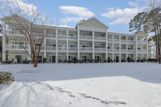 view of snow covered property