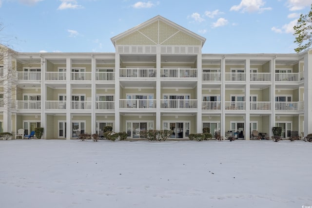 view of snow covered property