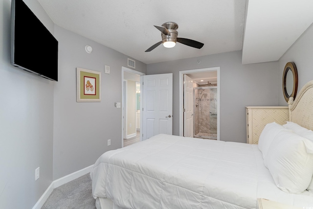 4103 N Ocean Blvd Unit 504, North Myrtle Beach, SC 29582 - bedroom featuring baseboards, ceiling fan, ensuite bathroom, and carpet floors