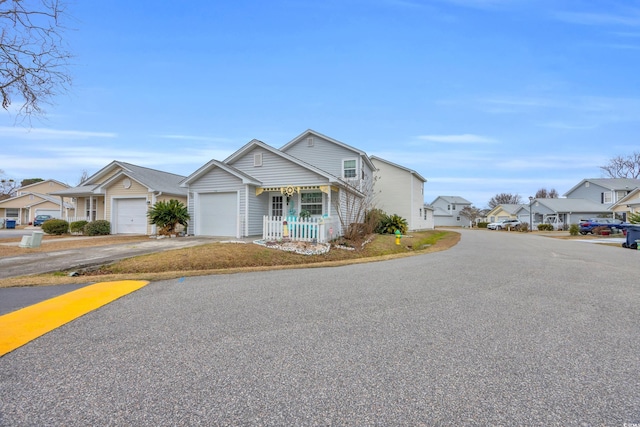 412 Chesterfield Ct, Myrtle Beach, SC 29577 - view of front of house featuring driveway, a residential view, and a garage