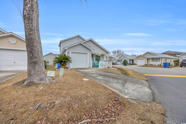 412 Chesterfield Ct, Myrtle Beach, SC 29577 - view of front of house with covered porch, a residential view, and concrete driveway
