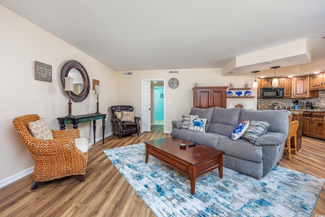 living room featuring hardwood / wood-style floors