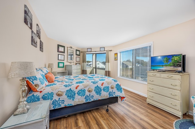 bedroom with light wood-type flooring