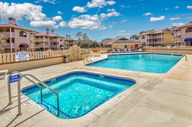 view of pool featuring a patio