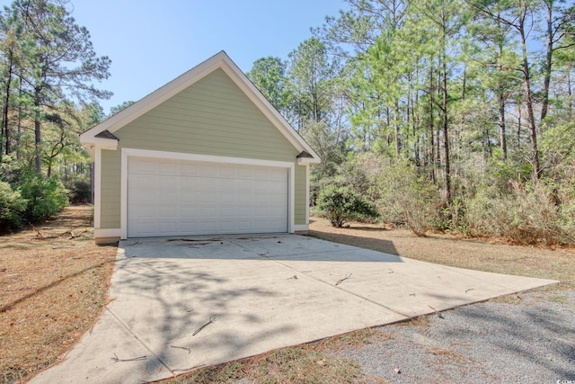 garage featuring driveway