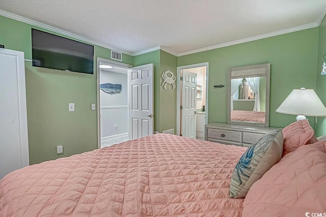 bedroom with crown molding and ensuite bathroom