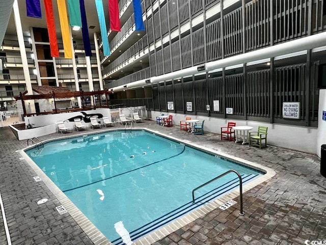 view of pool with a patio area