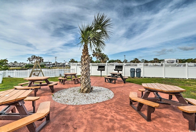 view of patio / terrace with a water view