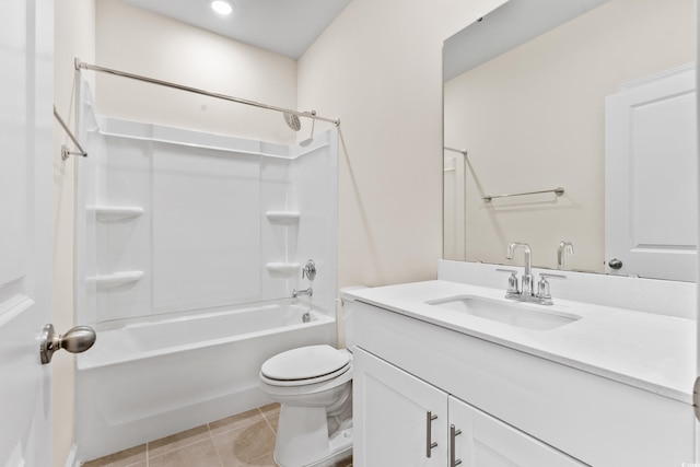 full bathroom featuring vanity, tile patterned floors, toilet, and bathtub / shower combination