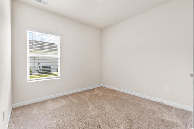 unfurnished room with carpet floors