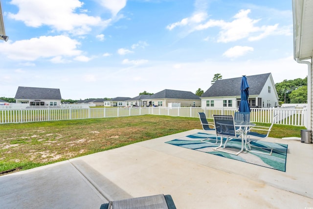 exterior space with a yard and a patio area