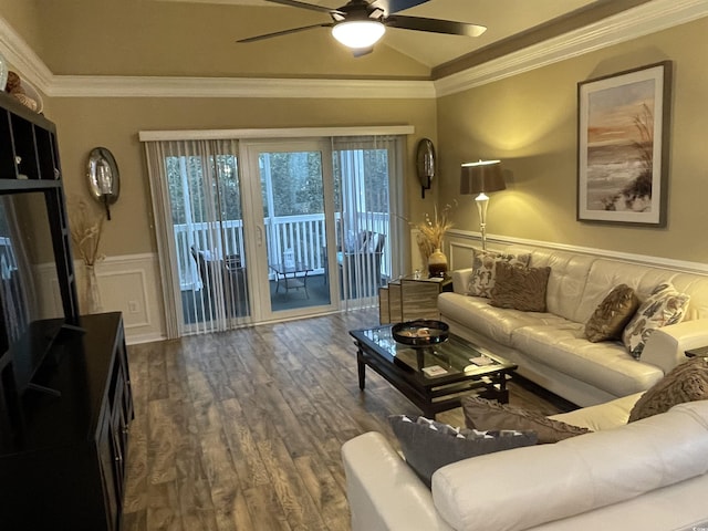 living room with dark hardwood / wood-style flooring, crown molding, lofted ceiling, and ceiling fan