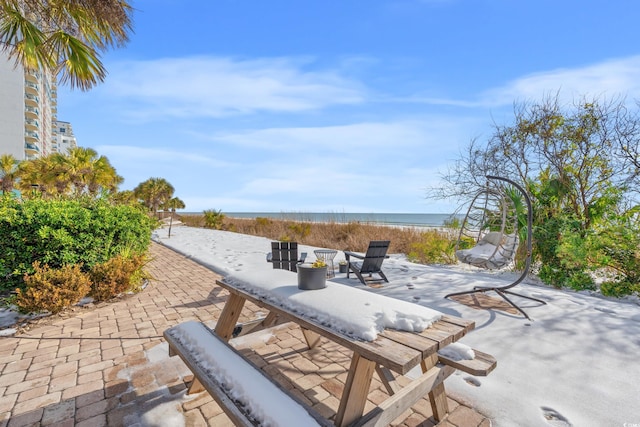 view of patio / terrace featuring a water view