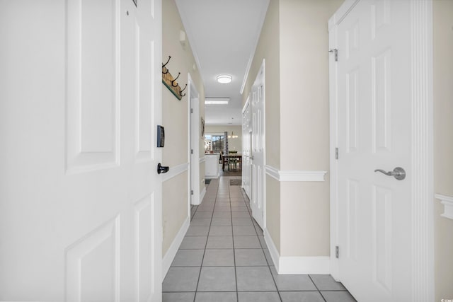 hallway with light tile patterned flooring