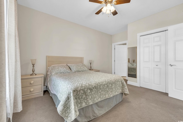 bedroom with carpet floors, a closet, and ceiling fan