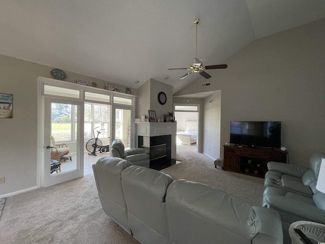 living room with light carpet, high vaulted ceiling, and ceiling fan