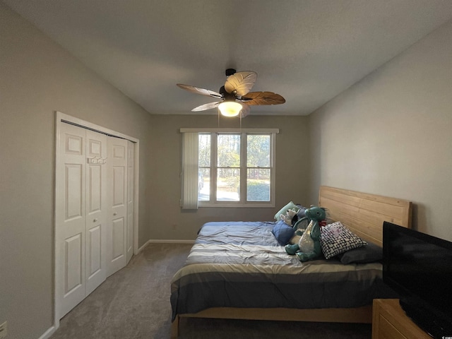 bedroom featuring carpet floors, a closet, and ceiling fan