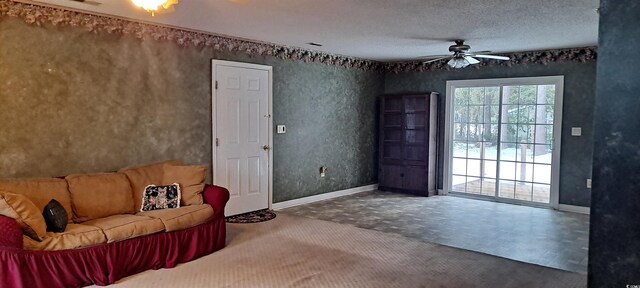 entrance foyer featuring tile patterned floors and ceiling fan