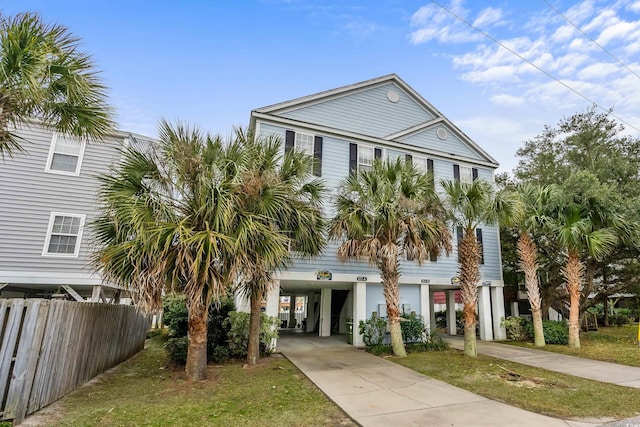 beach home featuring a carport