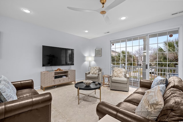 living room with ceiling fan