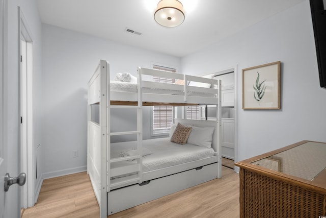 bedroom with light hardwood / wood-style floors