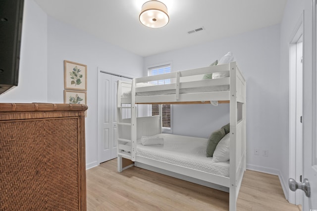 bedroom featuring light hardwood / wood-style floors