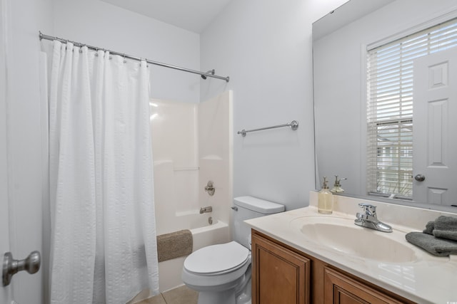 full bathroom featuring toilet, vanity, shower / bathtub combination with curtain, and tile patterned flooring