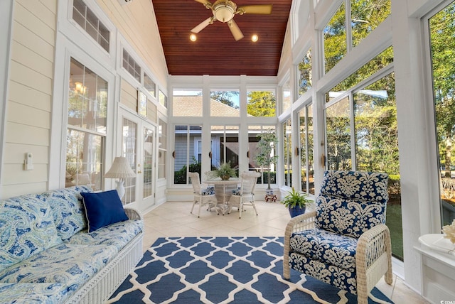 sunroom / solarium with wood ceiling and ceiling fan