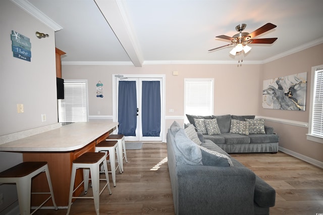 living room with french doors, ceiling fan, crown molding, and hardwood / wood-style floors