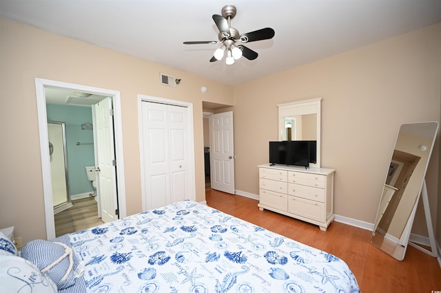 bedroom with ceiling fan, connected bathroom, a closet, and light hardwood / wood-style flooring