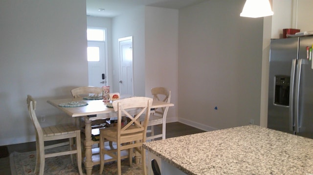 dining room with baseboards