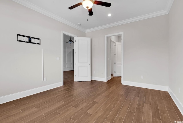 unfurnished bedroom featuring hardwood / wood-style flooring, ceiling fan, and ornamental molding