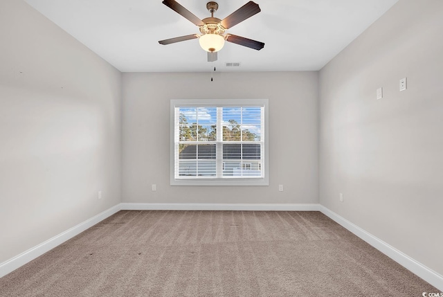 carpeted empty room with ceiling fan