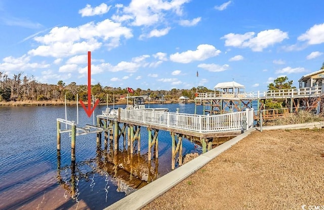 view of dock with a water view