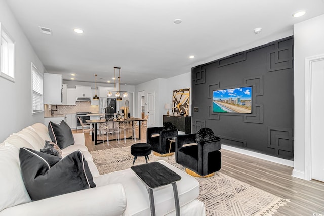 living room featuring light hardwood / wood-style floors