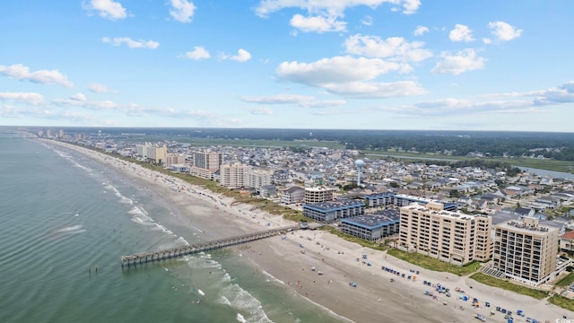 aerial view with a water view and a view of the beach