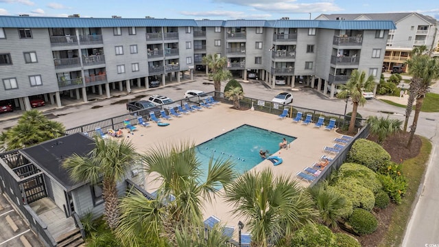 view of swimming pool with a patio area