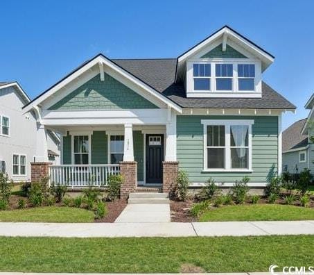 1816 Tryon Dr, Myrtle Beach, SC 29588 - craftsman-style home featuring covered porch and a front yard