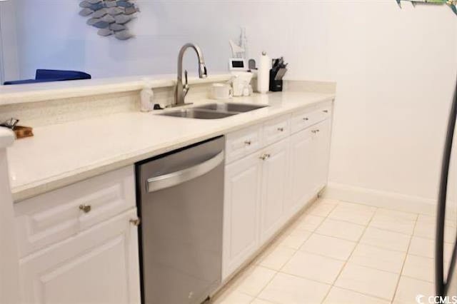 kitchen featuring white cabinetry, sink, dishwasher, and light tile patterned flooring