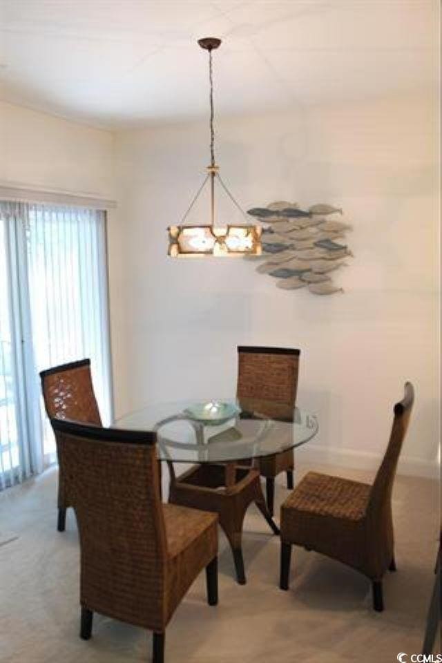 dining area featuring a healthy amount of sunlight