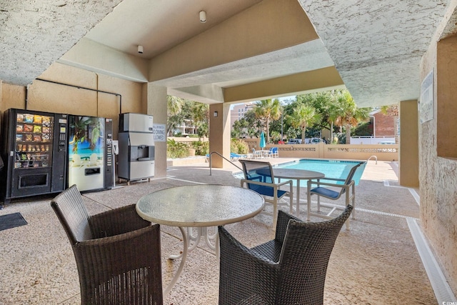 view of patio / terrace with a community pool