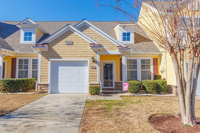 view of front of property featuring a garage