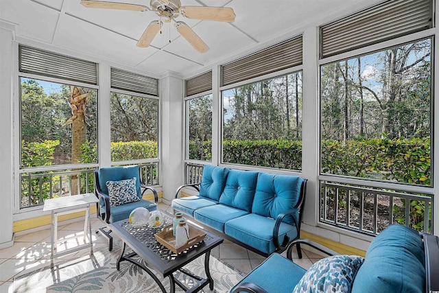 sunroom with ceiling fan and plenty of natural light