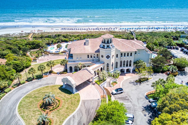 bird's eye view featuring a water view and a view of the beach